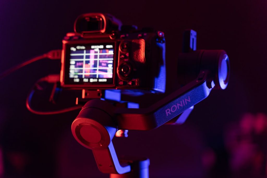 black-nikon-dslr-camera-with-black-background-wwadnjlxjxm Sony A7III with gimbal DJI Ronin SC